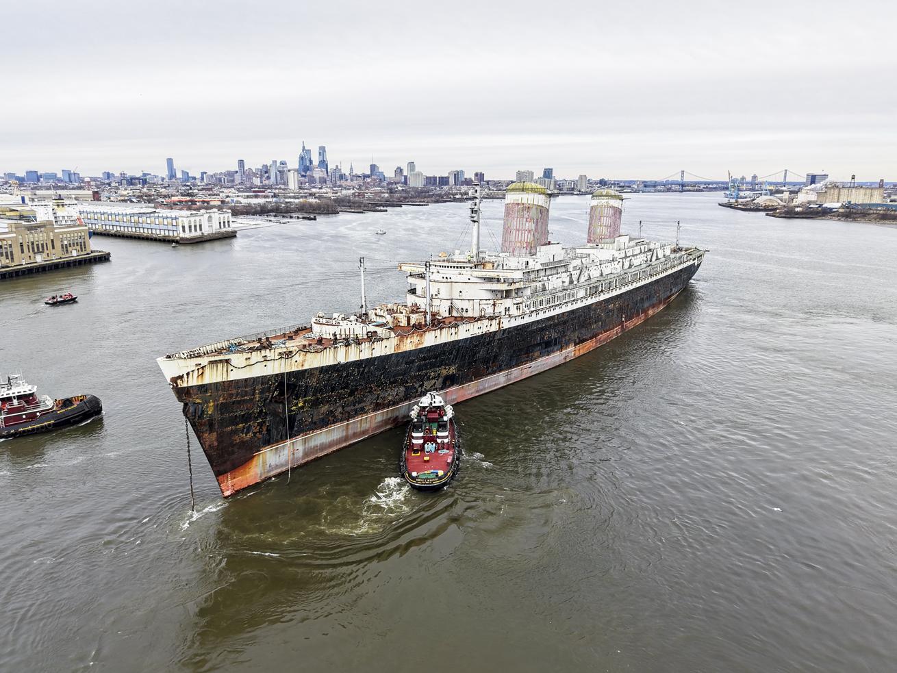 SS *United States* departs Philadelphia’s Pier 80 en route to Mobile, Alabama, for remediation