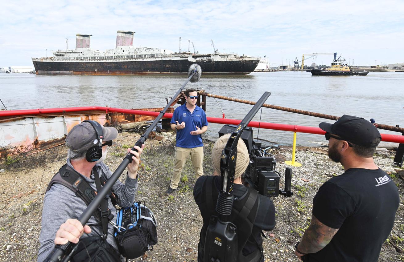 The author alex fogg interviewed in front of the SS United States in Mobile Alabama