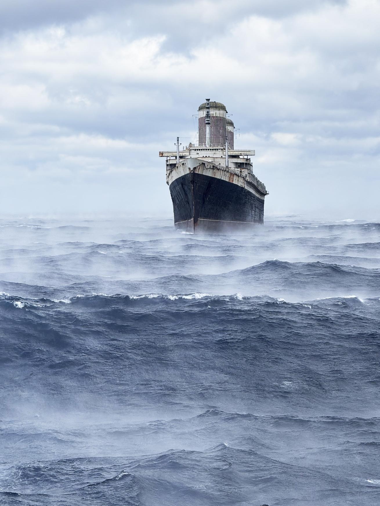 SS *United States* in tow off the Outer Banks of North Carolina en route to Alabama