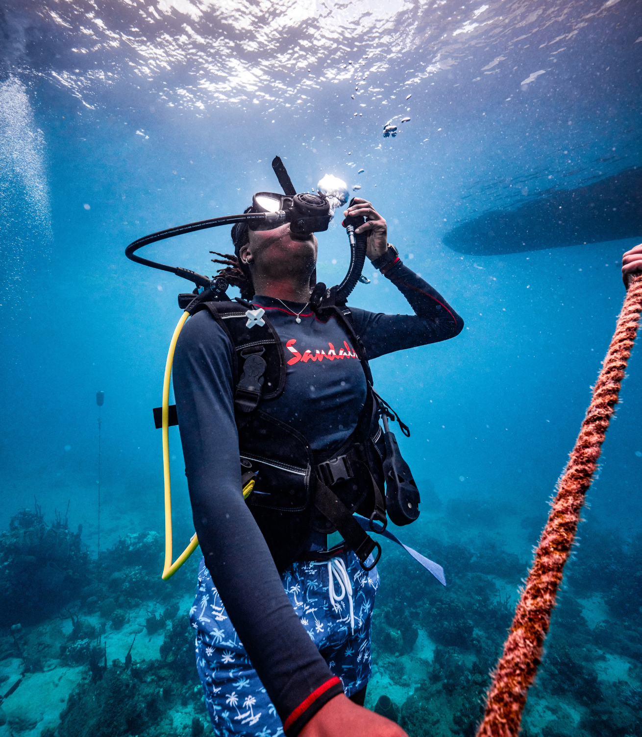 Scuba diver ascending to the surface