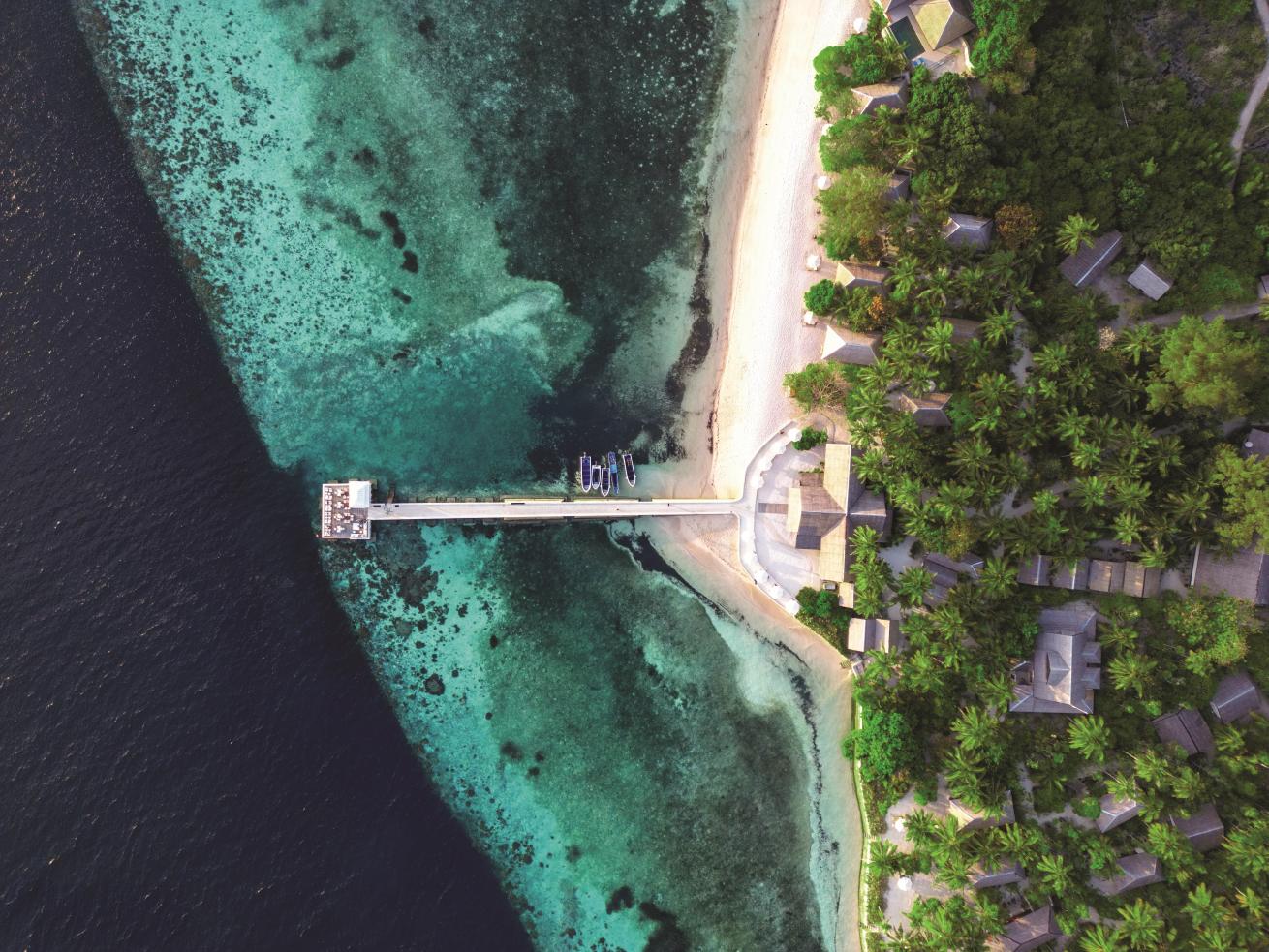Located at the edge of a white-sand beach, Wakatobi Dive Resort offers access to beauty above and below the water’s surface.