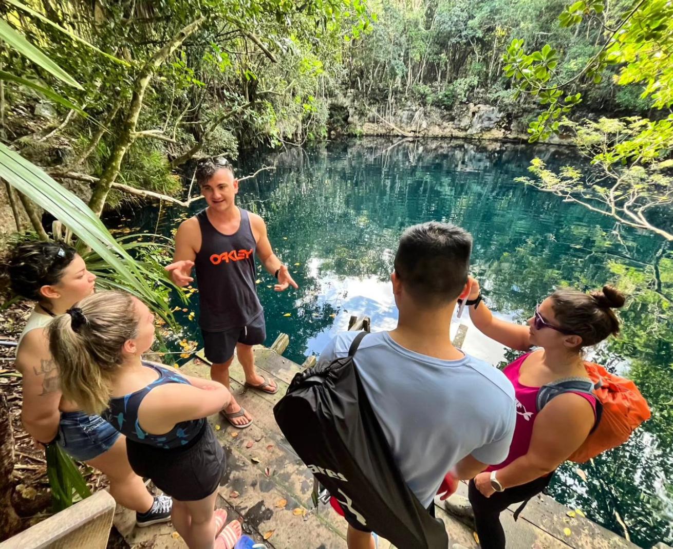 Fazah briefs students (including author, right) before freedive training at Cenote Angelita.