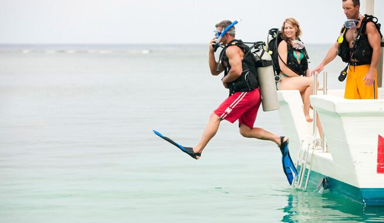 The perfect dive begins with a perfect giant stride.
