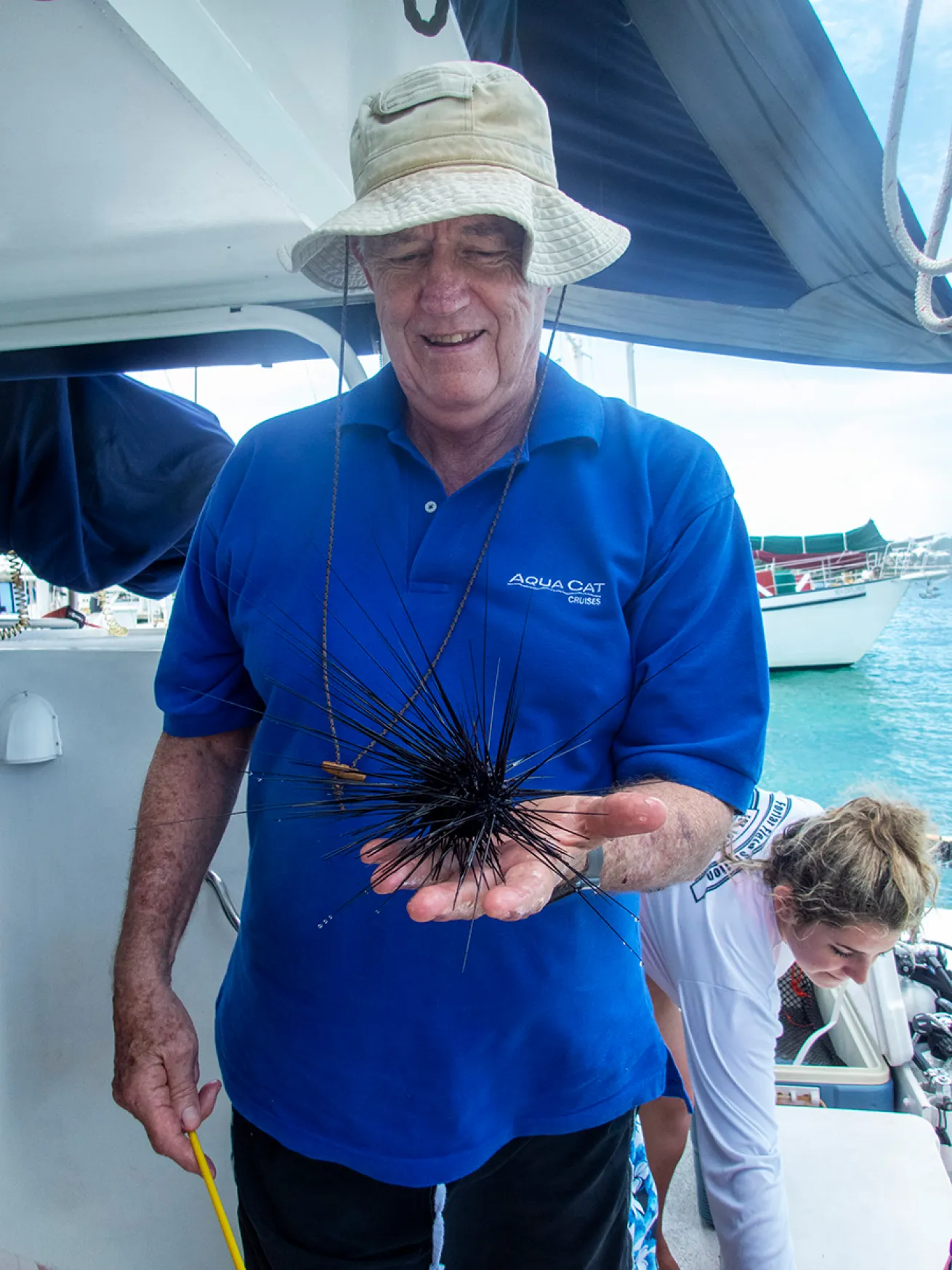 All Star founder Bruce Purdy holds Diadema antillarum.