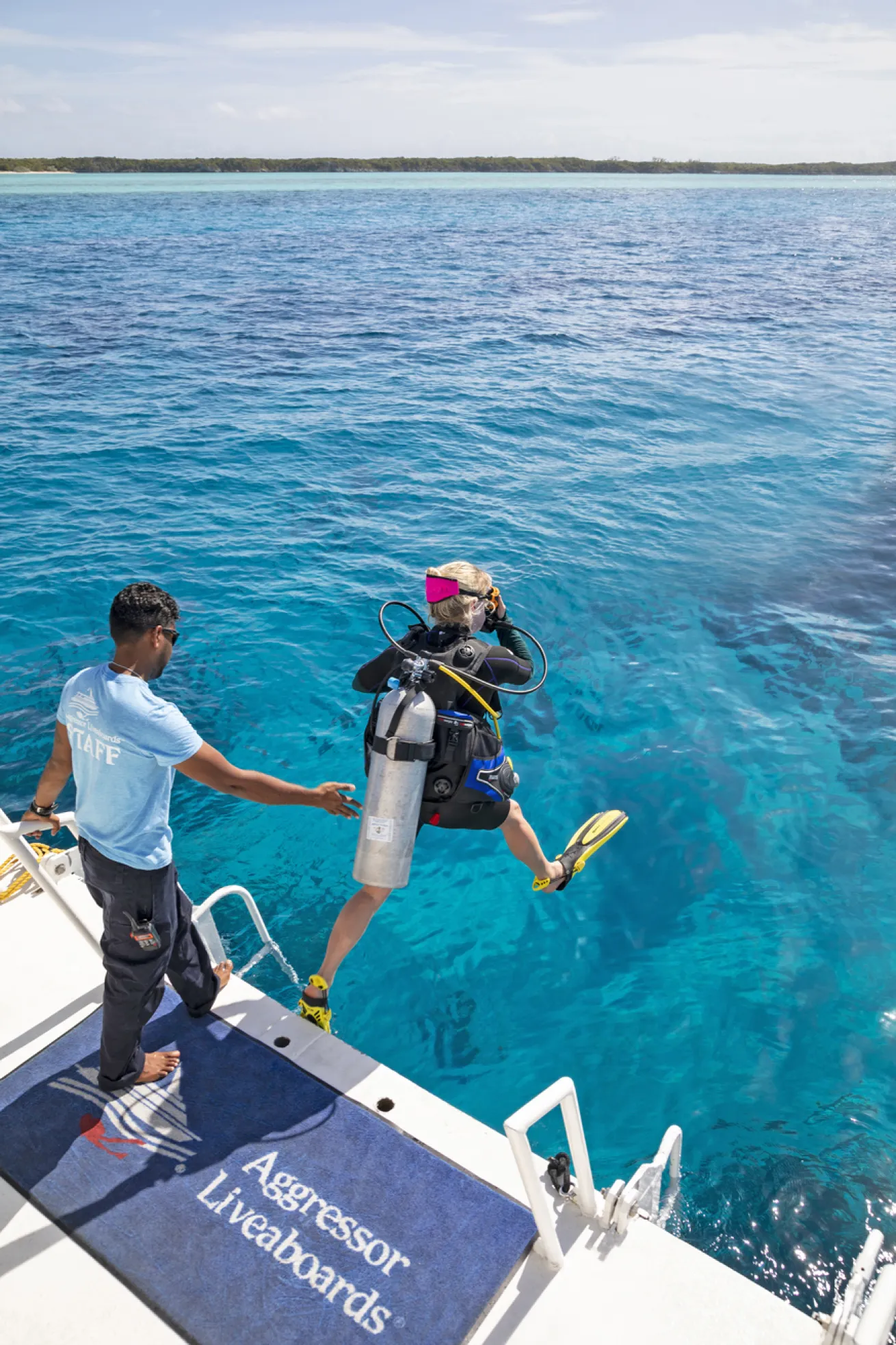Guests can gear up on the dive deck and giant stride from the liveaboard right into the Bahamas’ crystal-blue waters.
