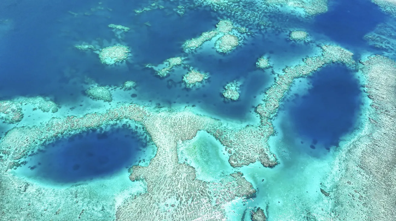 Welcoming shades of blue beckon to divers as they fly into Taveuni