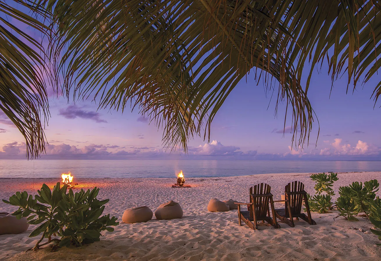 Beach bonfires set the mood before sunset