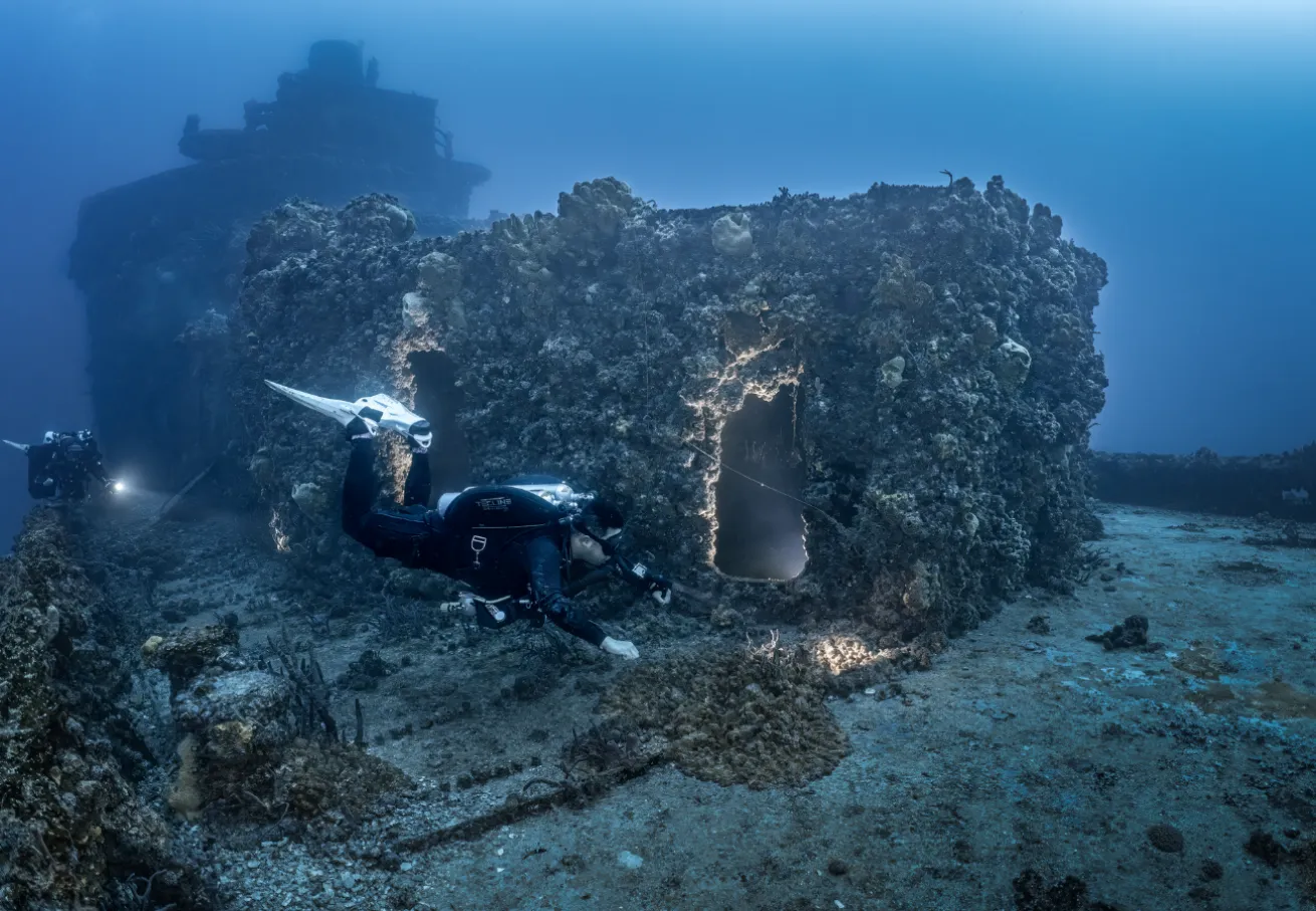 Two divers on a wreck