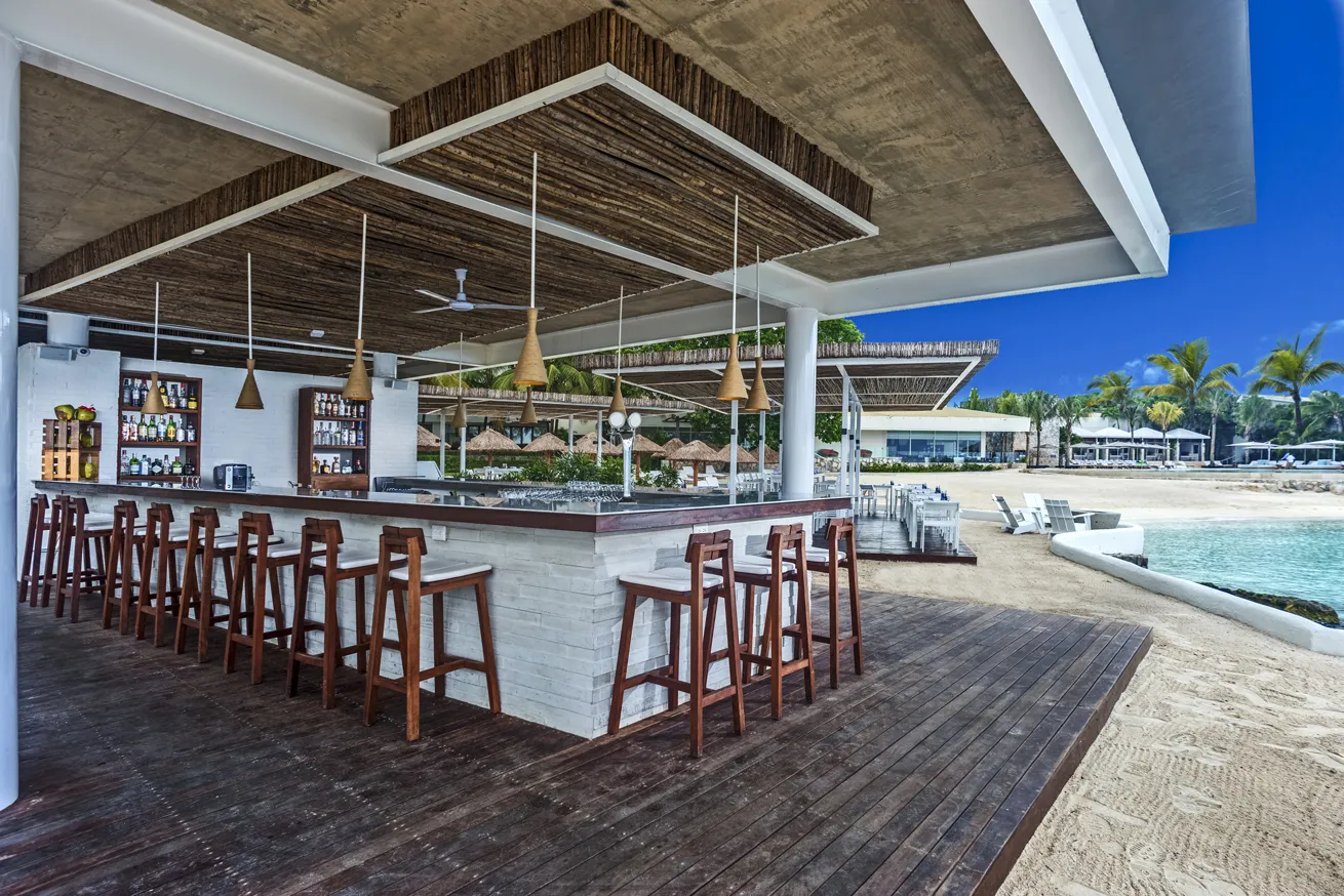 Le Cap Beach Club serves modern Mediterranean dishes complemented by an impressive cocktail menu—and stunning ocean views.