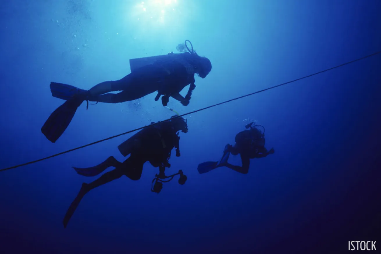 Divers having trouble equalizing during a dive.