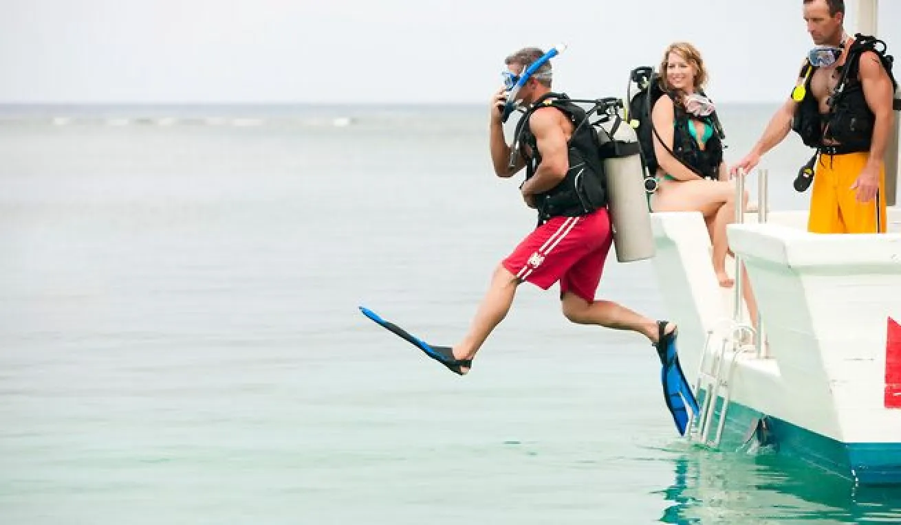 The perfect dive begins with a perfect giant stride.
