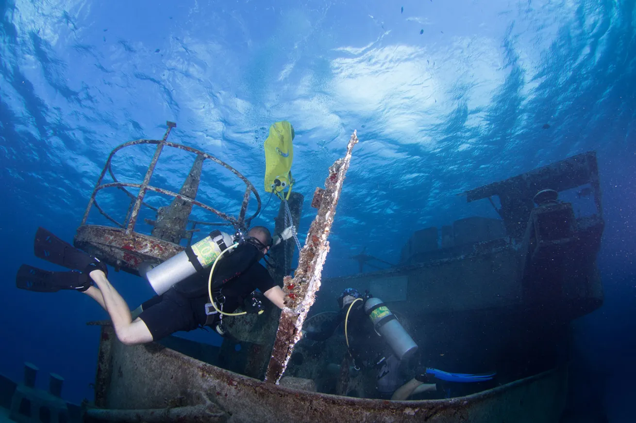 removing one of Kittiwake's damaged panels