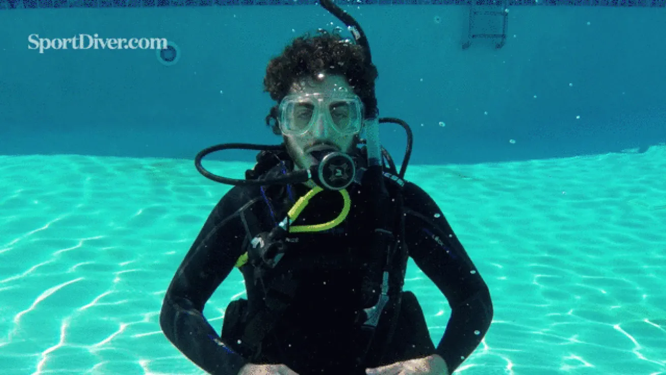 scuba hand signals weight