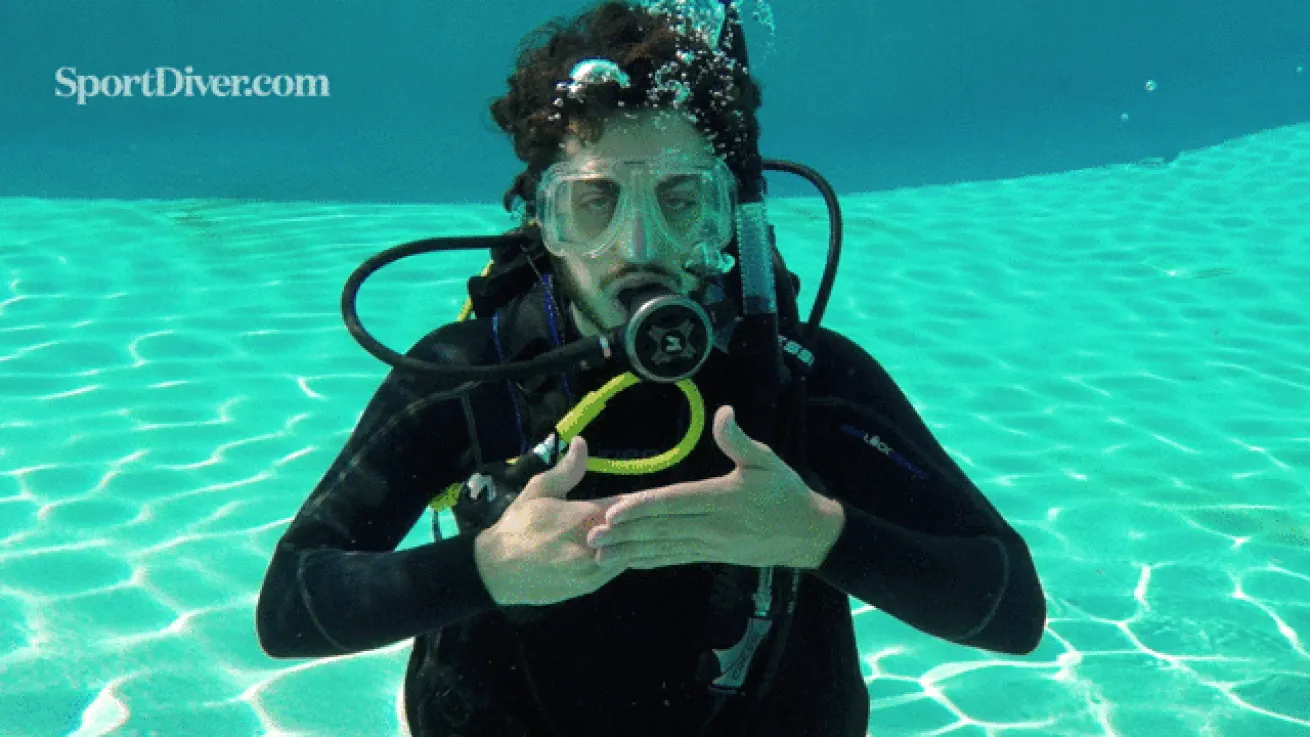 scuba hand signals out of breath