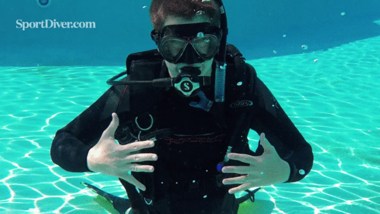 scuba hand signals pain