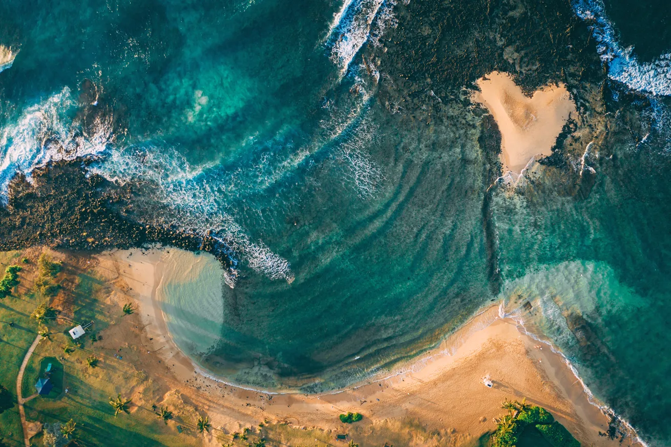 Kauai, Hawaii, is home to some of the best snorkeling featuring an abundance of active shallow-water marine life.


