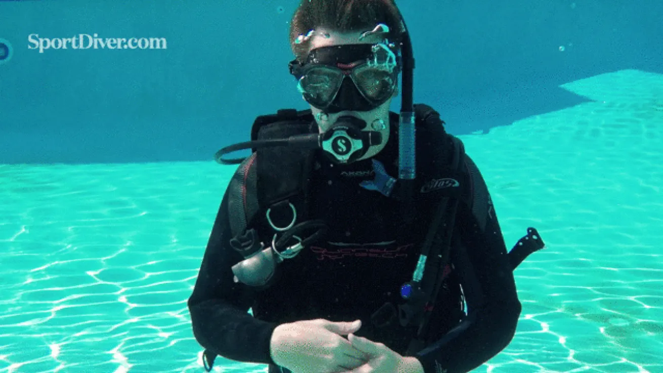 scuba hand signals sick