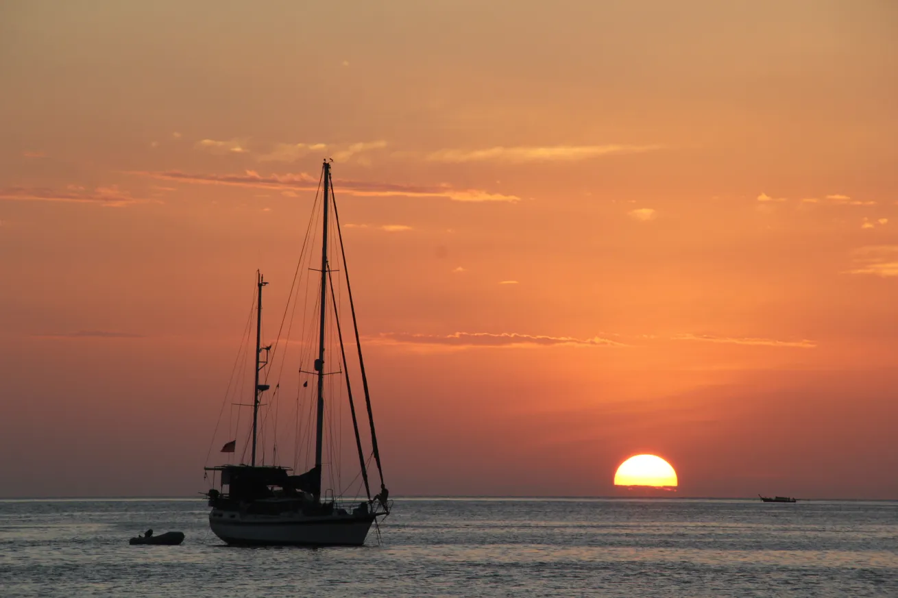 A picturesque sunset viewed from shore.