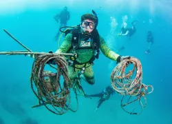 Scuba Divers Remove Trash From Ocean