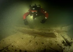 diver-hovers-over-german-river-wreck-credit-christian-howe.png.webp