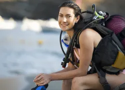 female-diver-topside-no-wetsuit-shutterstock-air-images.png.webp