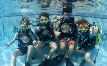 kids-scuba-in-pool-courtesy-jacks-diving-locker.jpg.webp